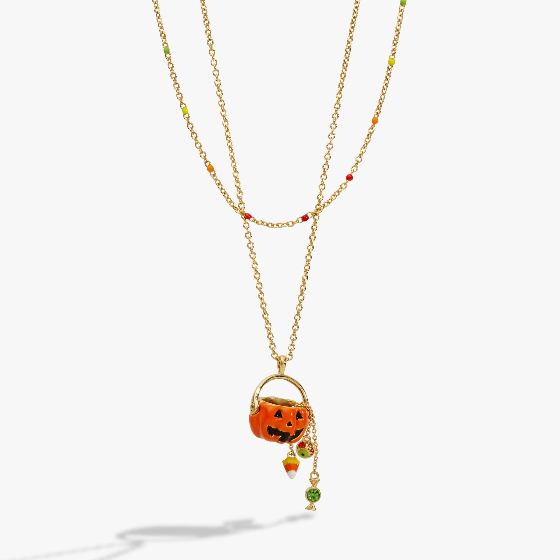 Two-strand gold layered necklace with Jack 'o' Lantern, candy, and eyeball charms.