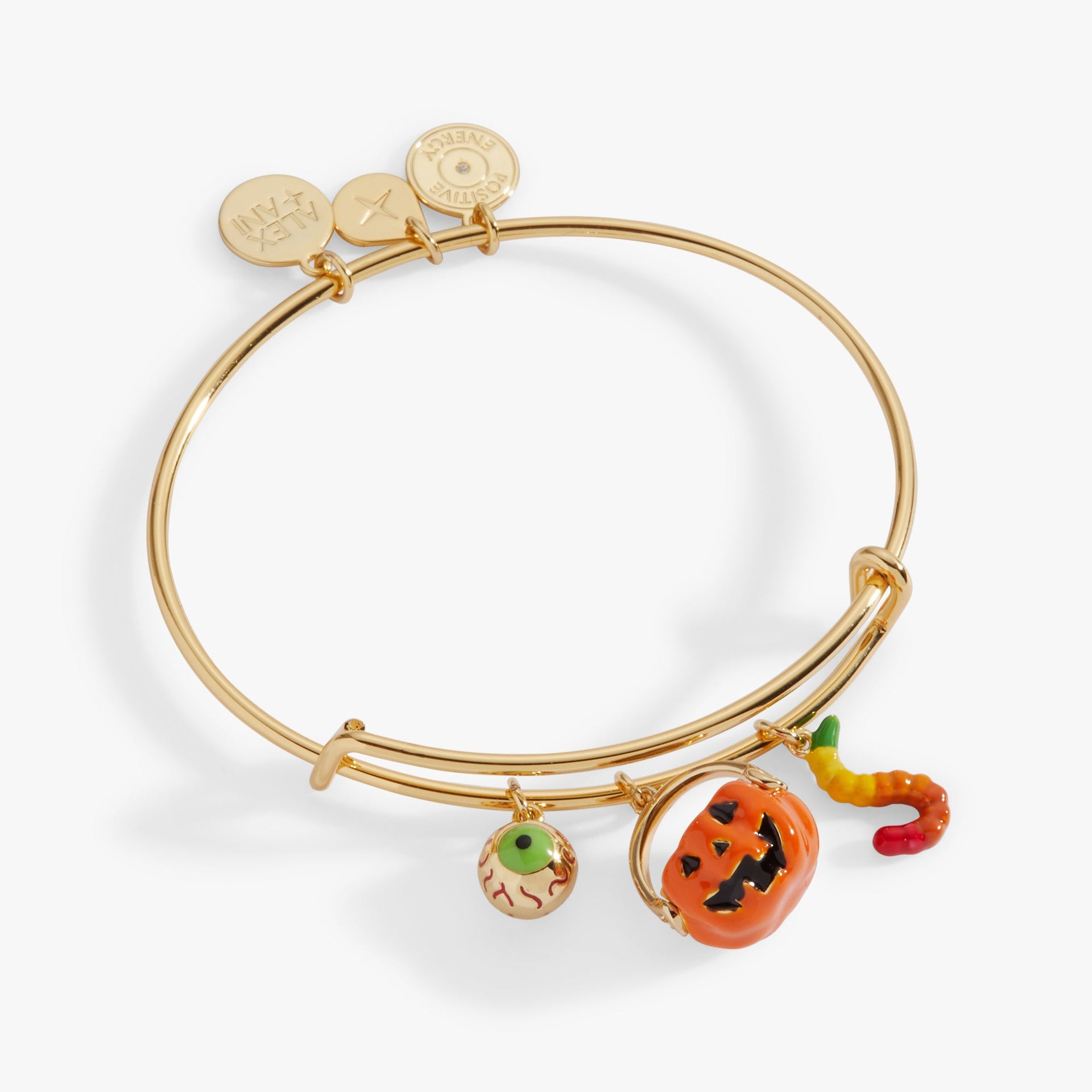 Alex and Ani Trick or Treat gold-tone bangle with enamel jack-o'-lantern, eyeball, and gummy worm charms.