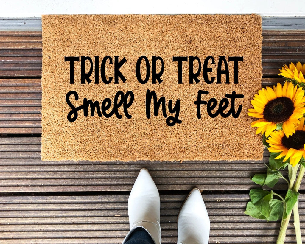 Trick or Treat Smell My Feet Halloween coir doormat in brown and black