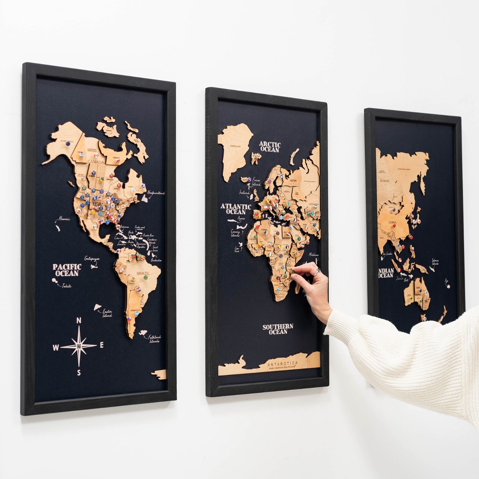 Elegant 3D Wooden Triptych World Map in gold finish mounted on a modern wall