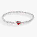 A stretch bracelet with a central heart charm featuring the inscription 'true love'.