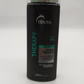 Bottle of Truss Therapy Strengthening Shampoo 10.14 oz for hair growth and revitalization.