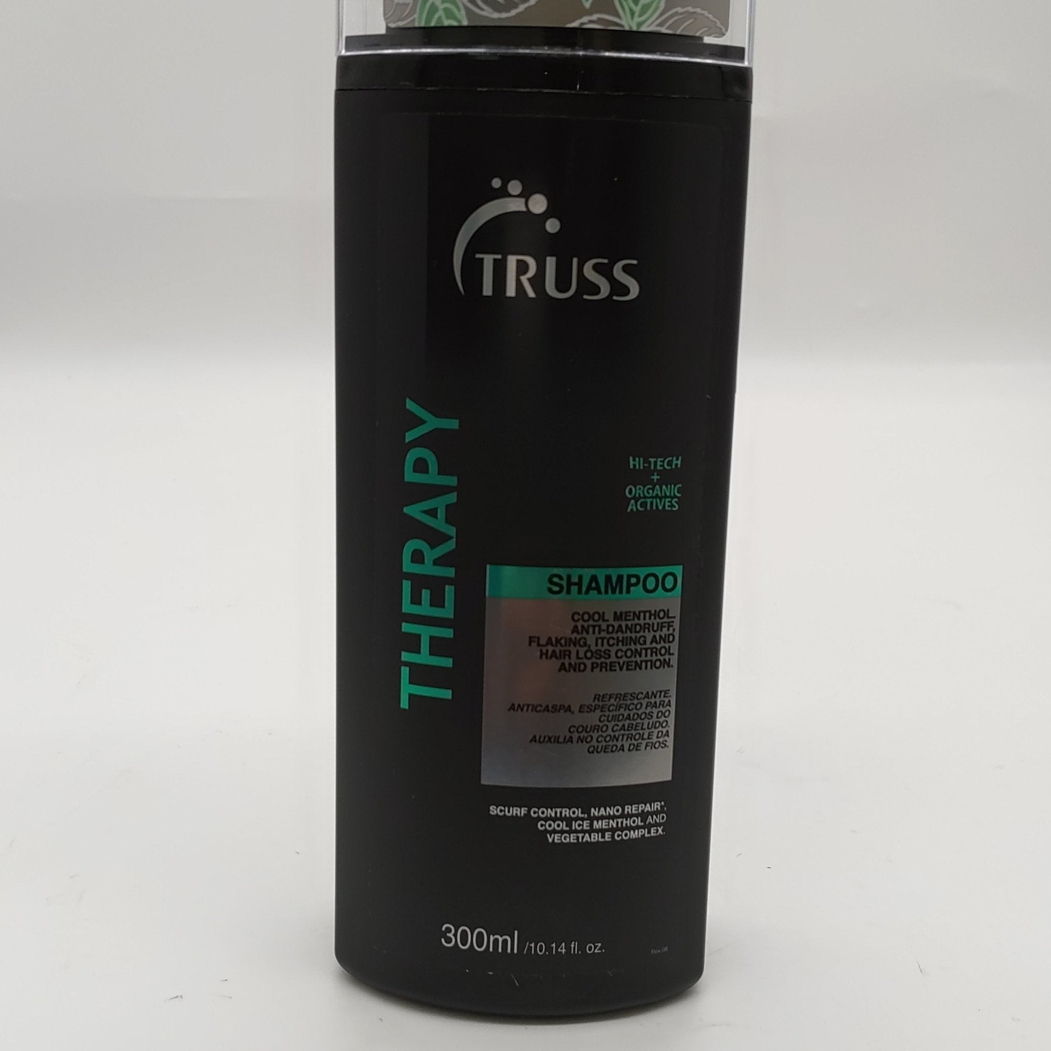Bottle of Truss Therapy Strengthening Shampoo 10.14 oz for hair growth and revitalization.