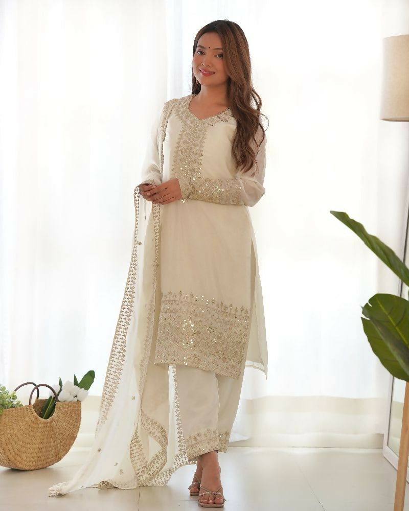 White 3-piece silk kurta set with intricate sequin embroidery work and matching dupatta