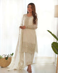 White 3-piece silk kurta set with intricate sequin embroidery work and matching dupatta