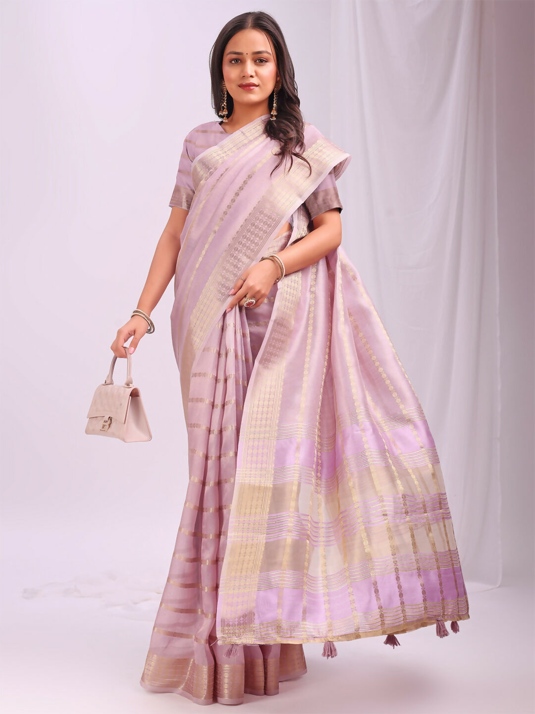 Stunning light pink organza saree for elegant festive events