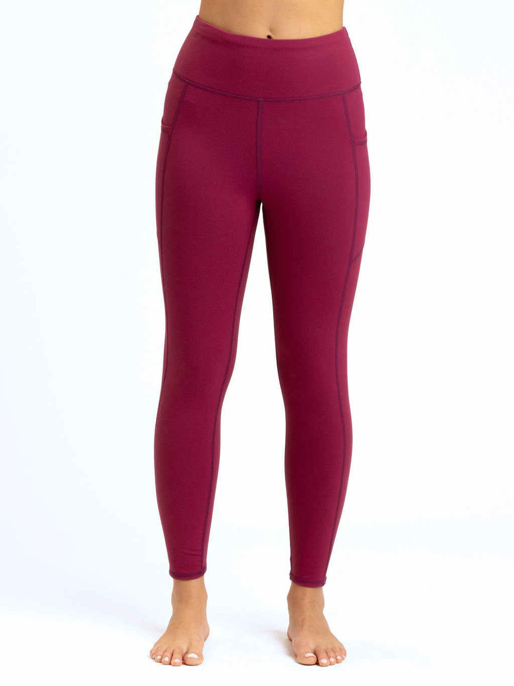 High-rise ankle-length leggings with side pockets in a soft, stretchy fabric.