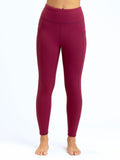 High-rise ankle-length leggings with side pockets in a soft, stretchy fabric.