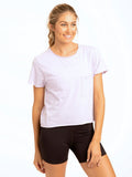 Woman wearing a high-waisted Maggie Triblend Tee in organic cotton and modal