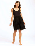 Alivia Scoop Neck Dress featuring a ribbed bodice, jersey skirt, and side pockets in a casual swing silhouette.