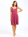Front view of the Alivia Scoop Neck Dress featuring a ribbed bodice and side pockets