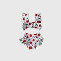 Girl's two-piece swimsuit featuring a cute cherry print on white background