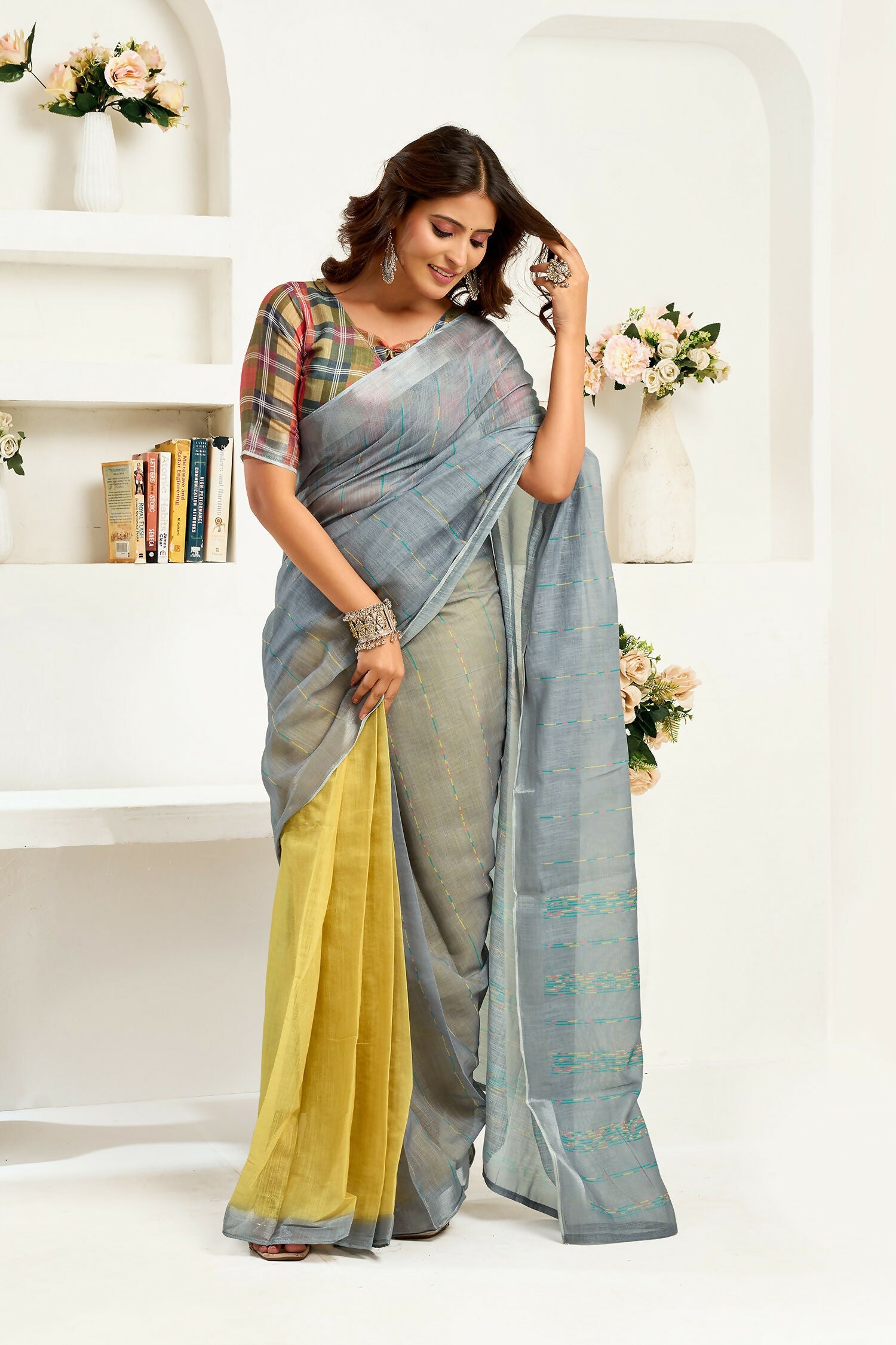 Grey linen ready-to-wear saree with stripes and a vibrant multicolored unstitched blouse.