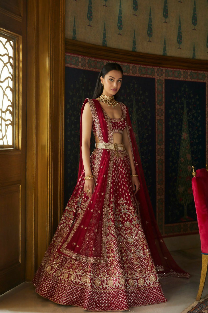 Maroon Taffeta Satin Silk lehenga choli with intricate gold zari and sequins embroidery