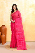 A close-up of a Rani Pink cotton blend Jamdani saree featuring detailed embellishments and traditional weaving.