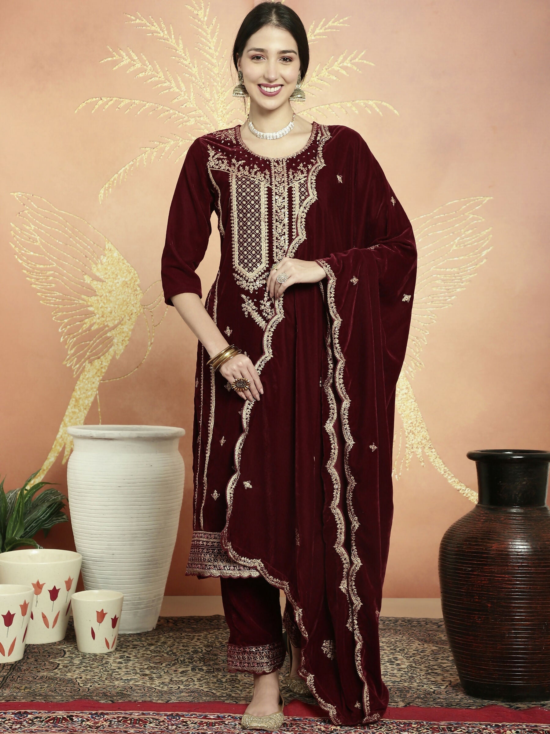 Maroon velvet straight kurta set with resham thread embroidery and sequin work