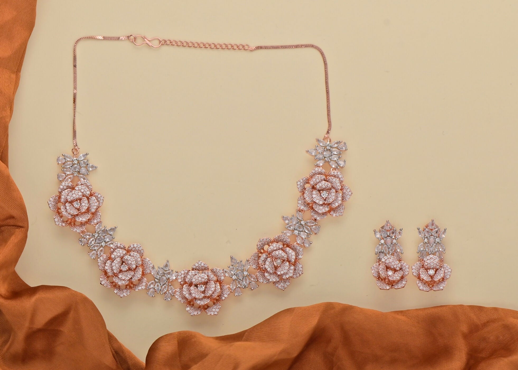 Golden White AD necklace set with brass construction and white stone embellishments