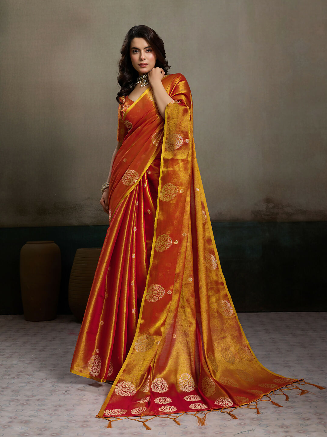 Shiny orange tissue silk saree with matching blouse