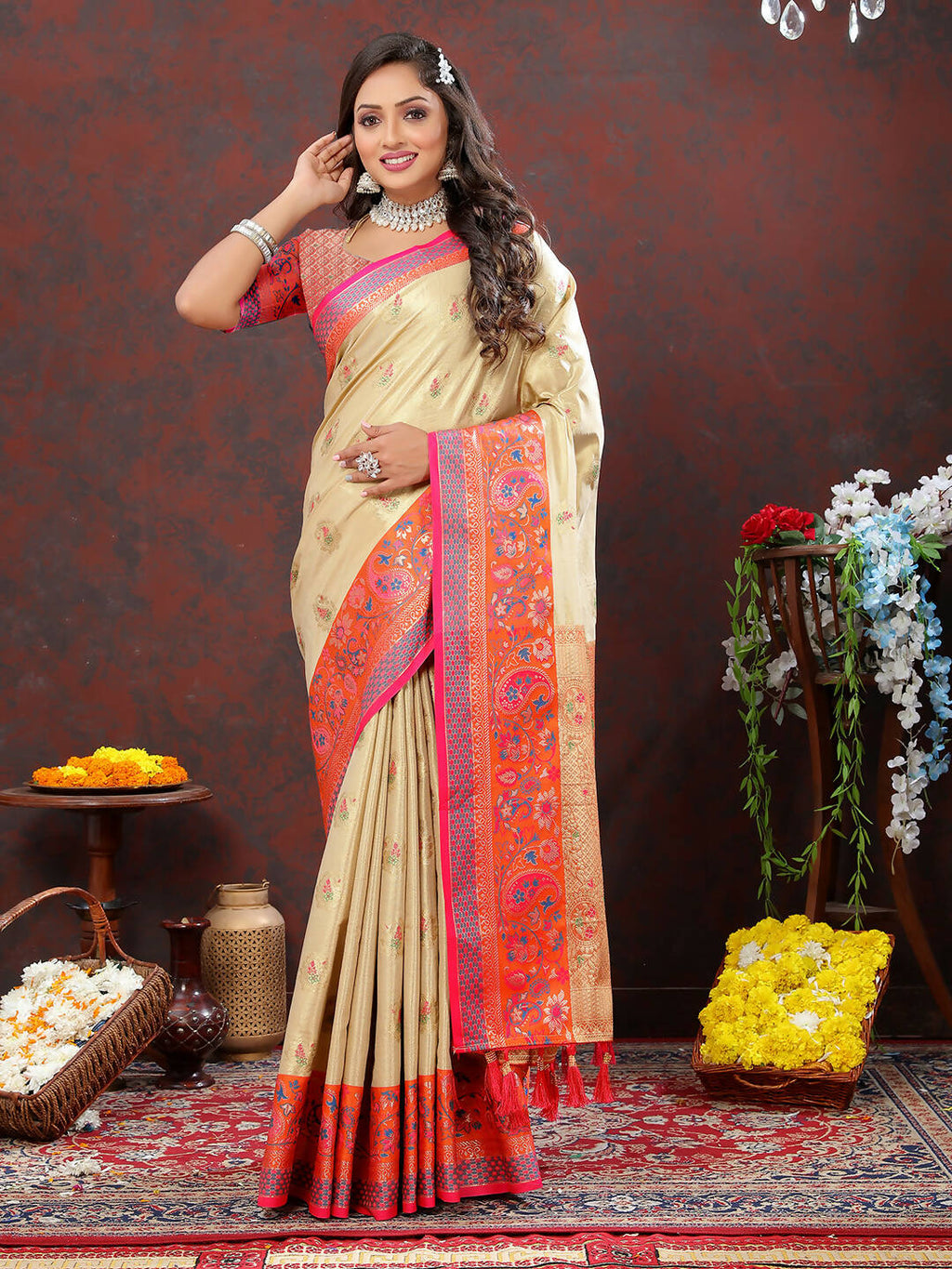 Luxurious cream Kanjivaram silk saree with detailed zari woven border