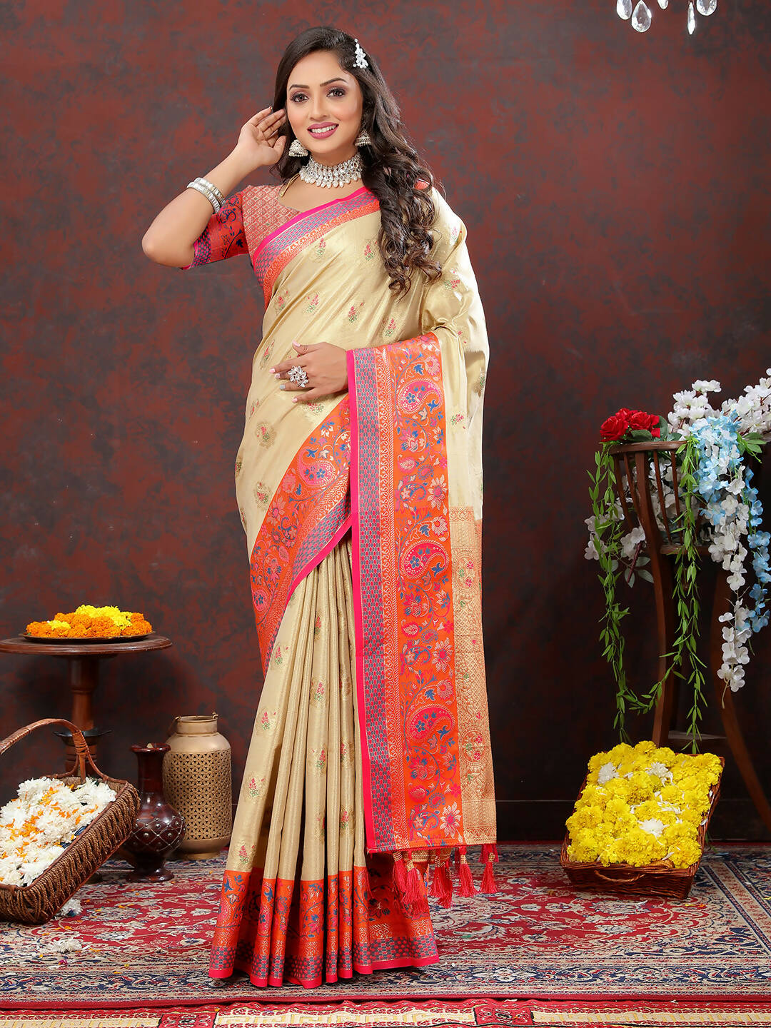 Luxurious cream Kanjivaram silk saree with detailed zari woven border