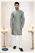 Men wearing a green silk straight kurta with all-over intricate thread embroidery