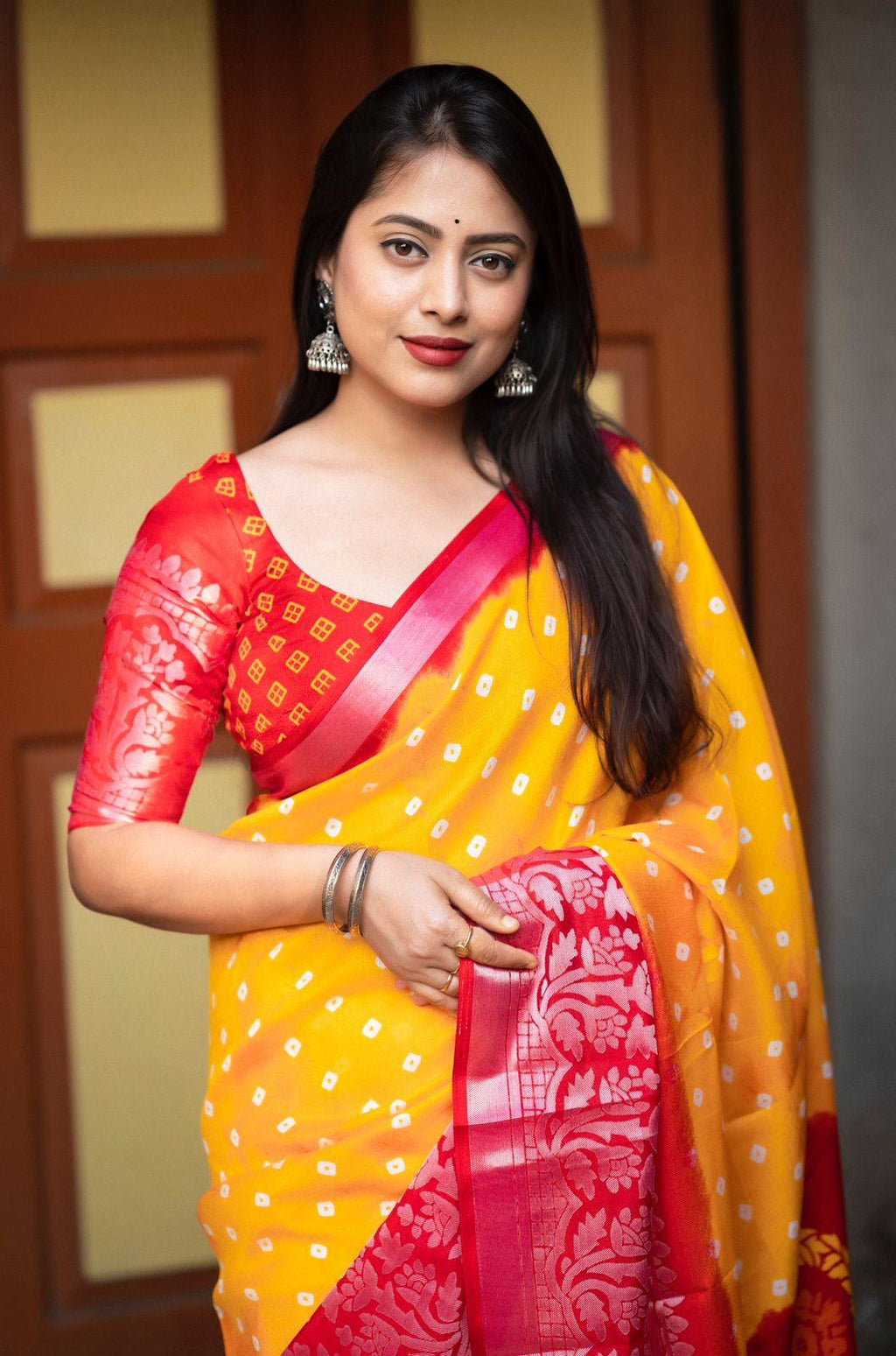 Yellow Jute Silk Printed Saree with Bandez and Cut Broaso Border