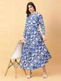 A beautiful blue cotton printed dress featuring intricate hand-work details and a flowy silhouette.
