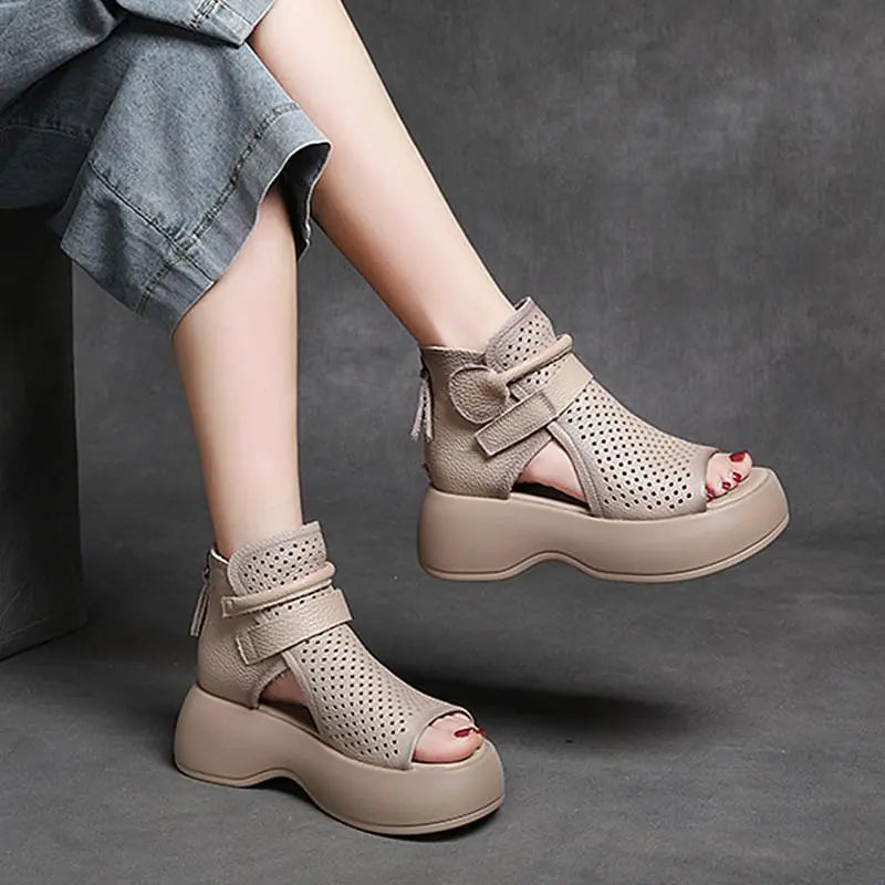 Women wearing high-top beige and brown perforated platform sandals with a back zipper