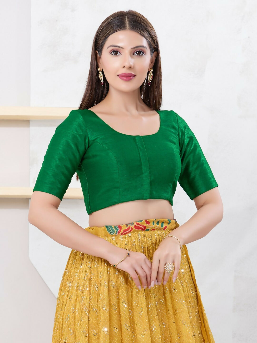 Green Dupion Silk blouse with elbow sleeves, round neck, and front open closure