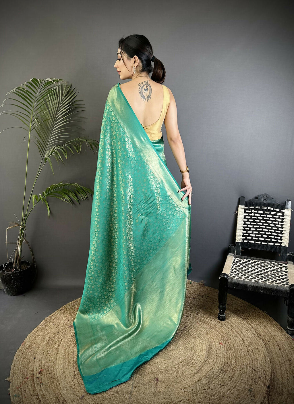 Rama Green Soft Satin Silk Banarasi Saree with Paisley Motifs