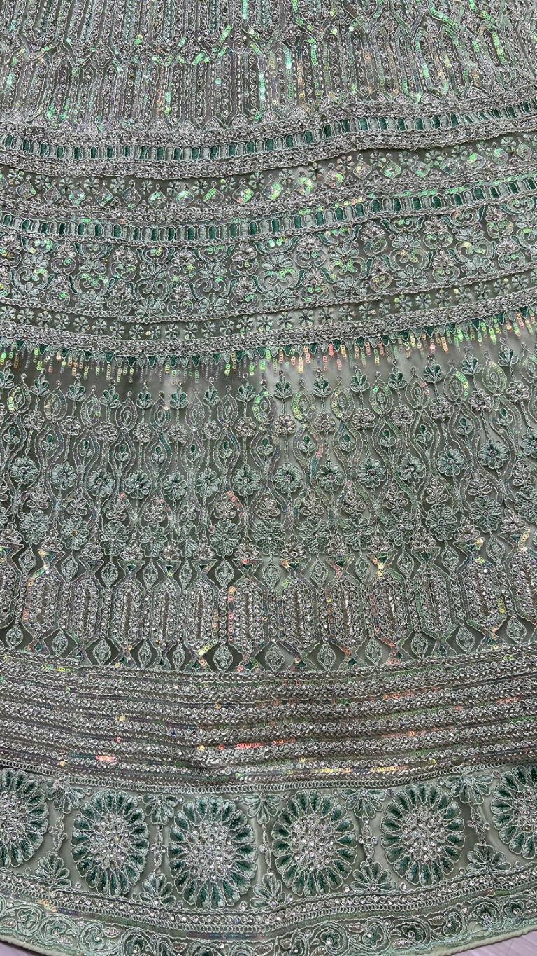 Pista Green Heavy Net Wedding Lehenga Choli with Rainbow Sequins