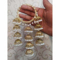 Gold tone bangle set with white pearls and 4-step hanging jhumkas