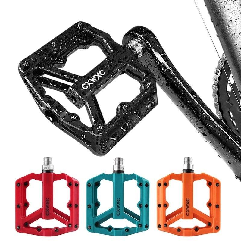 Ultralight nylon mountain bike flat pedals with 3 sealed bearings in black
