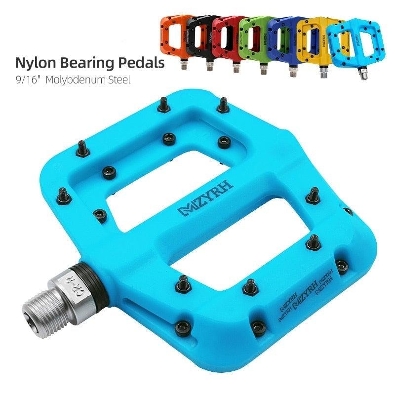 Ultralight nylon platform bicycle pedals with anti-skid nails and sealed bearings