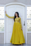 Vibrant yellow Anarkali dress with gold Zari and sequin embroidery