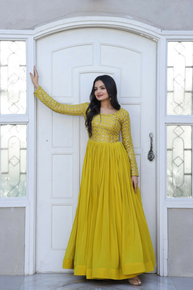 Vibrant yellow Anarkali dress with gold Zari and sequin embroidery