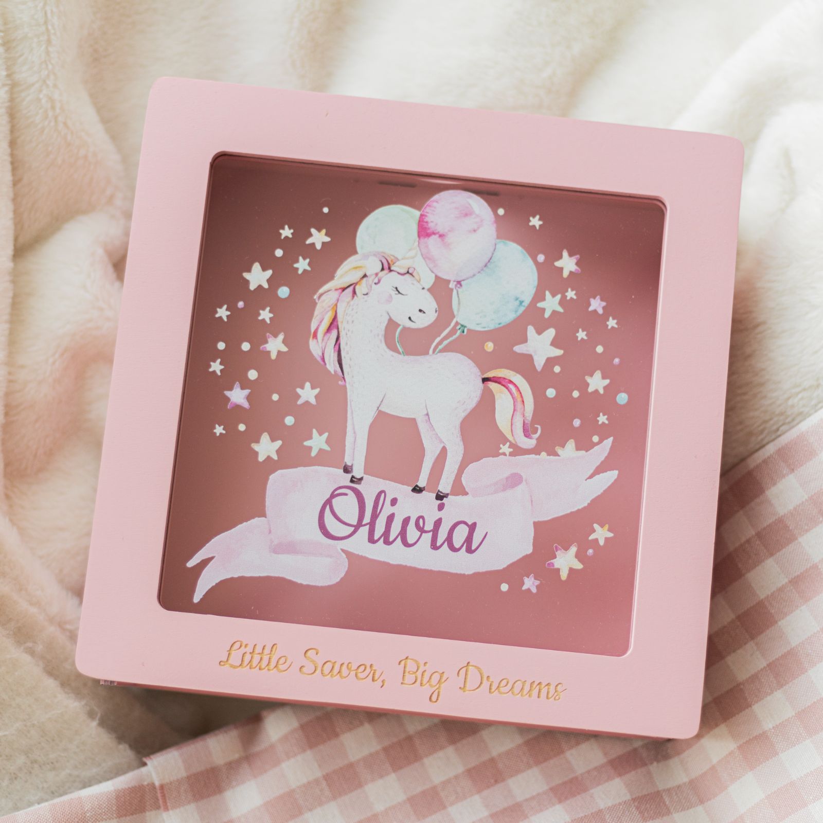 Personalized pink and natural-wood acrylic storage box with a unicorn motif for a child's nursery