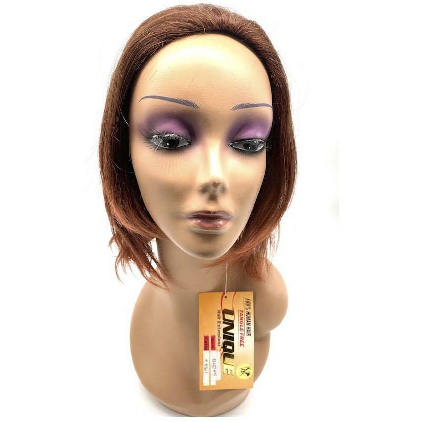 Model wearing a 100% human hair half wig in Medium Brown and Copper Red blend