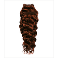 Woman wearing glamorous Spanish Wave human hair extensions in auburn and red-brown.