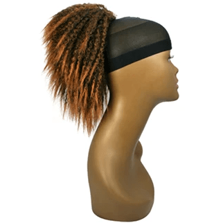 Woman wearing stylish urban braids accented with Unique Twist String in black and brown-copper.