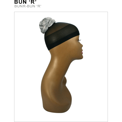 Woman wearing a polished Kanekalon bun hair extension for an elegant updo