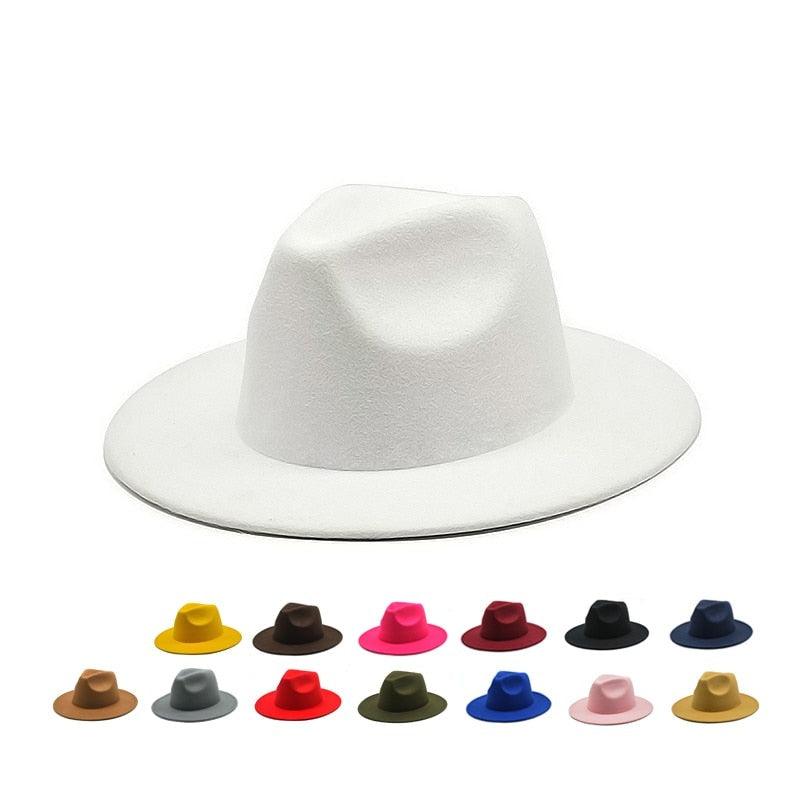 Elegant white vintage-style wide brim fedora hat for women displayed against a neutral background