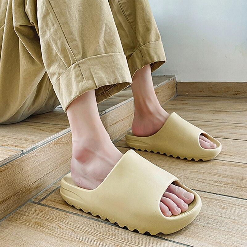 Unisex lightweight EVA non-slip shower slides in a minimalist open-toe design