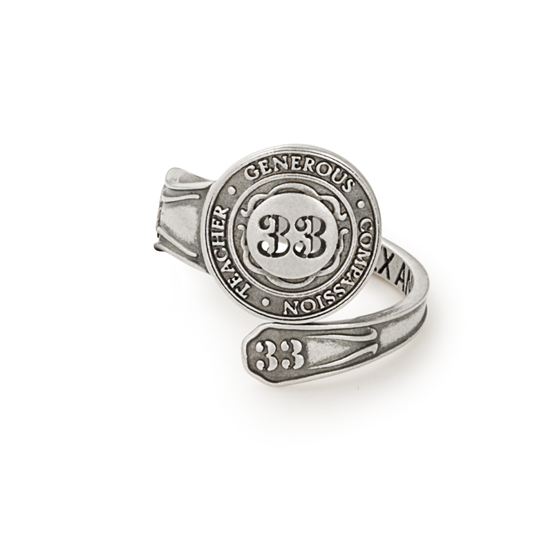Vintage-style silver Number 33 spoon ring with artistic detailing, perfect for bohemian fashion.