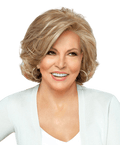 A woman wearing the Untold Story wig in multi-tonal blonde with dark-brown rooted highlights.