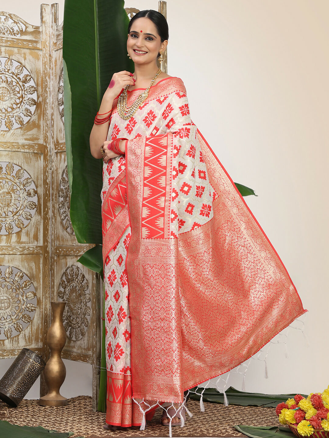 Classic red and white linen cotton saree with matching red blouse fabric.