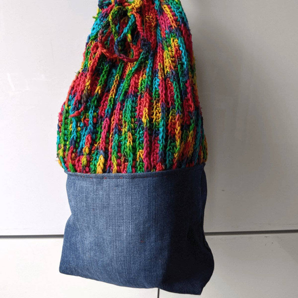 Upcycled Denim Bag Crochet Kit including yarn and instructions for making a shoulder bag