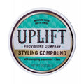 Uplift Provisions Company styling compound with matte finish in teal and white packaging