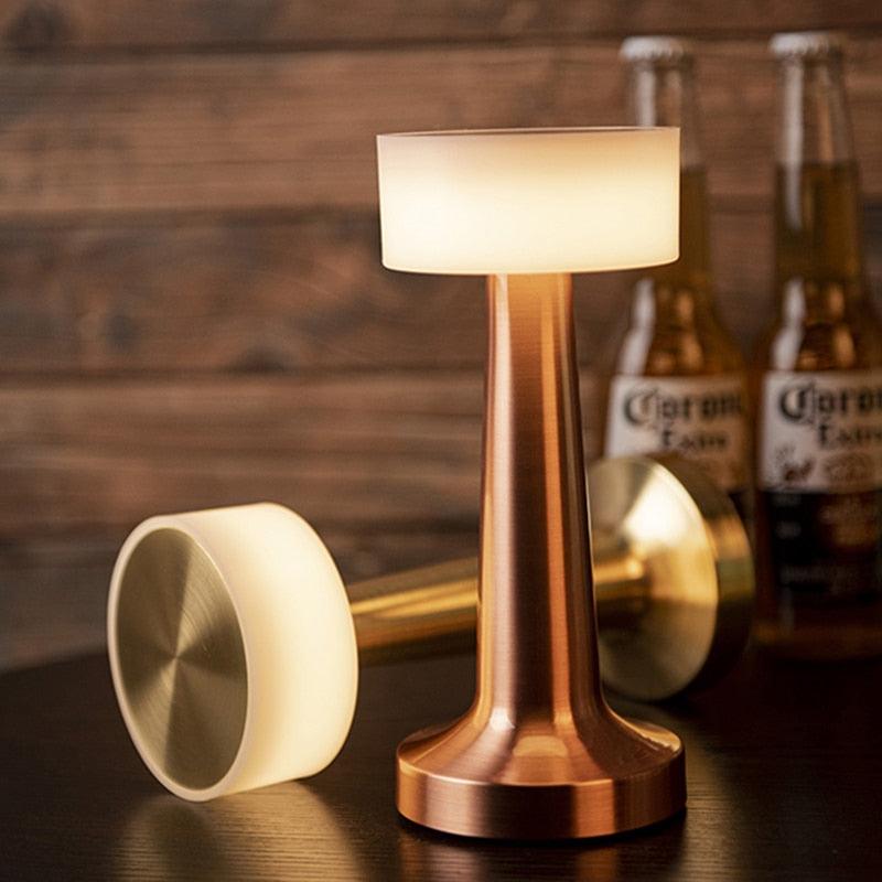 Modern wireless charging LED bar table lamp with touch-dimming functionality.