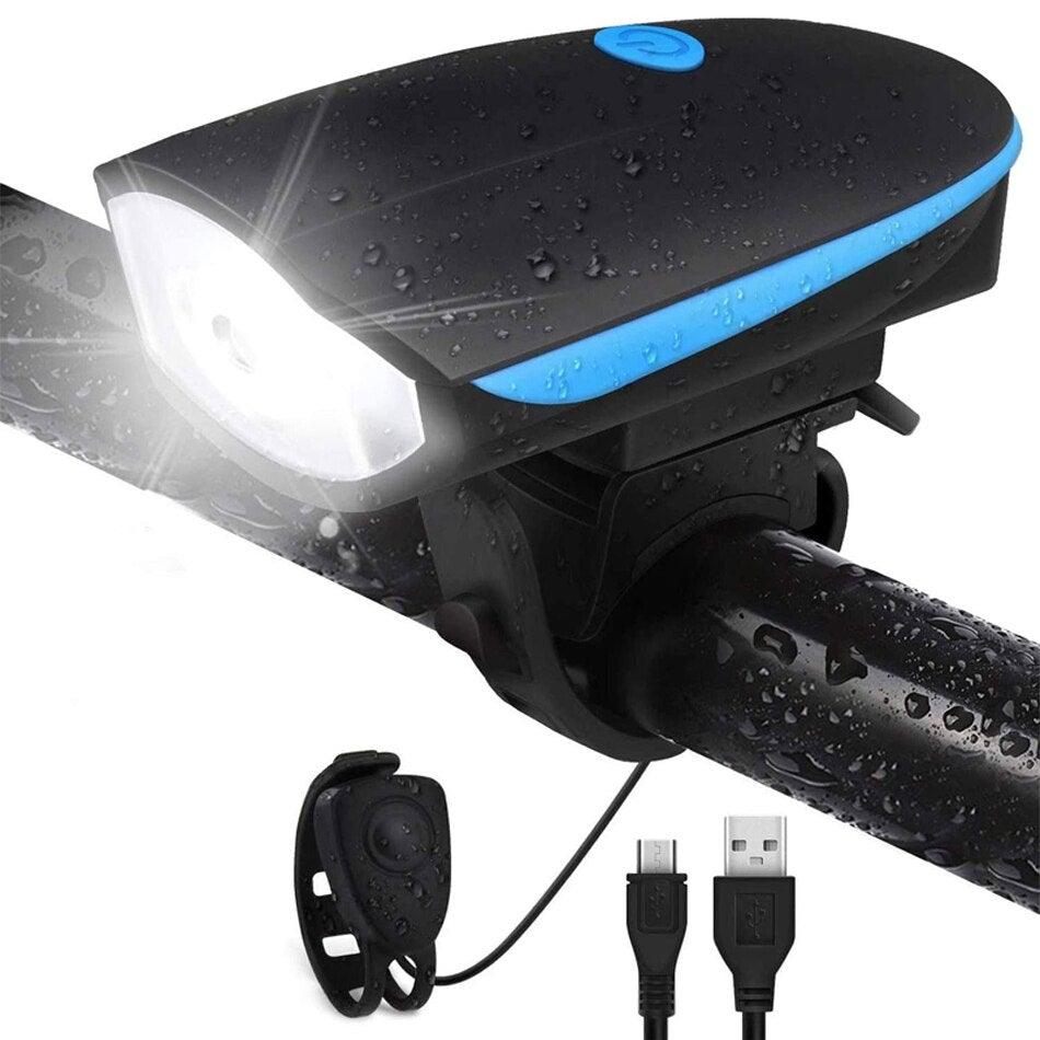 USB rechargeable bicycle front light and electric horn mounted on a bike handlebar